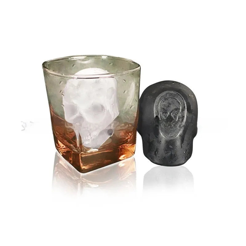 3D Halloween skull ice cube tray made from blue food-grade silicone, showing detailed mould cavities.