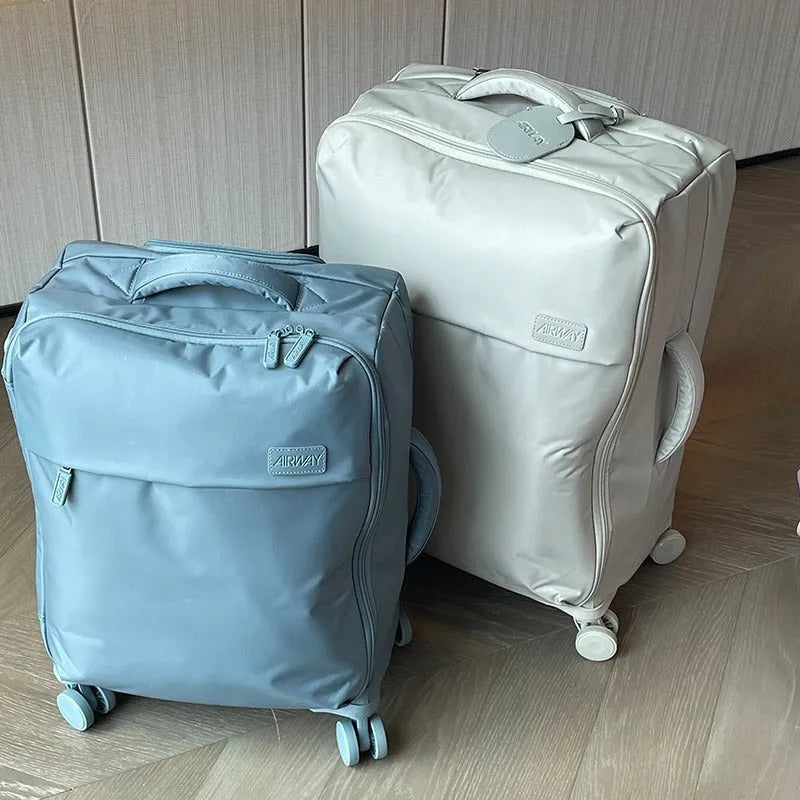 Ultra-light waterproof Oxford cloth suitcase in bluestone green with universal wheels and antimicrobial lining
