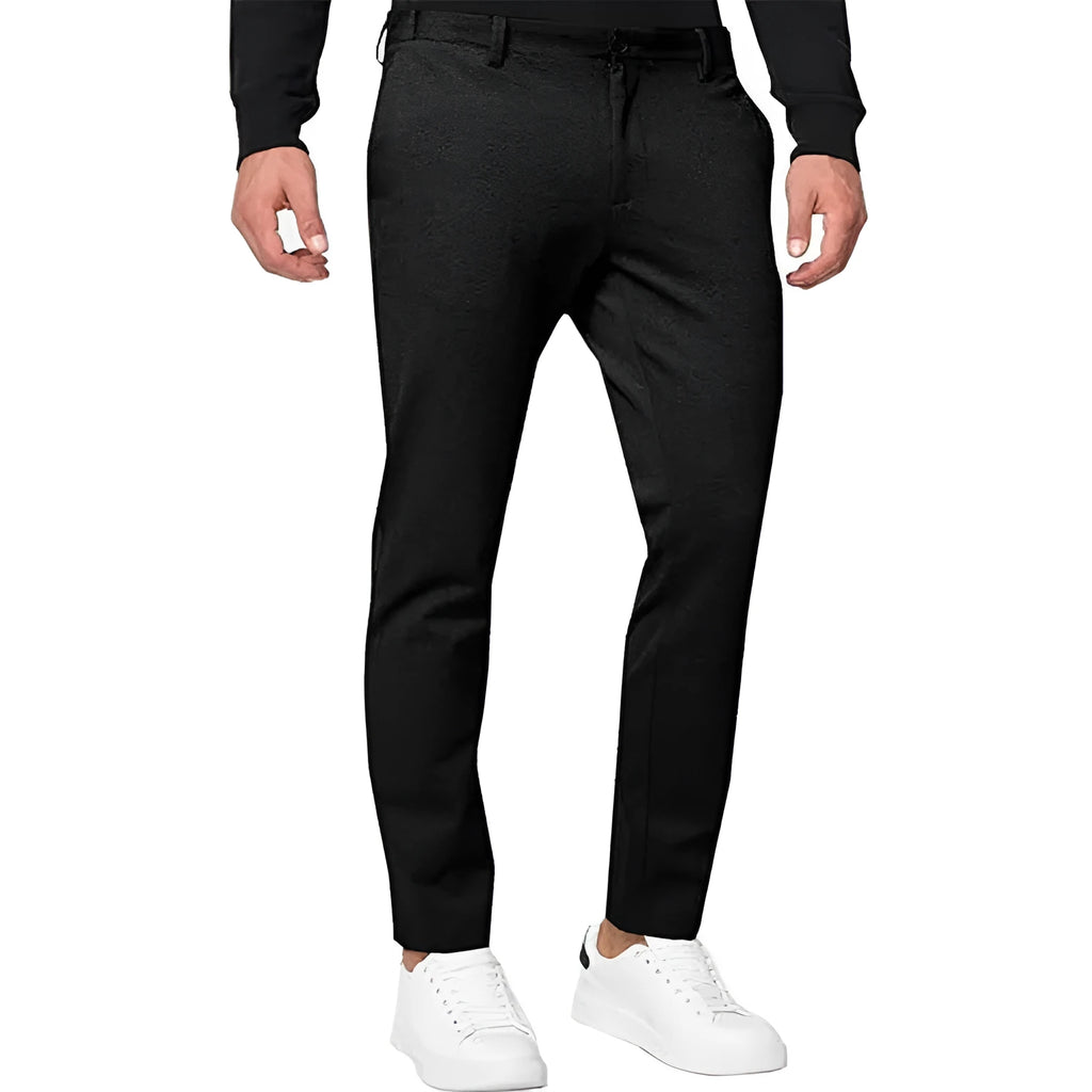 Men's slim-fit tapered chino trousers in a stretch cotton blend fabric, shown in a solid colour.