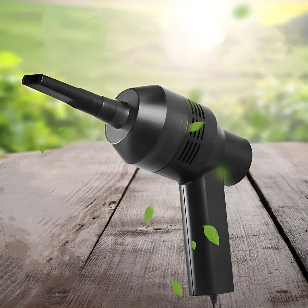 Black handheld mini vacuum cleaner for desktop and keyboard cleaning