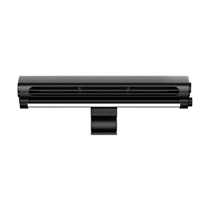 Black bladeless fan with lighting lamp attached to laptop screen showing USB connection and screen clamping mechanism