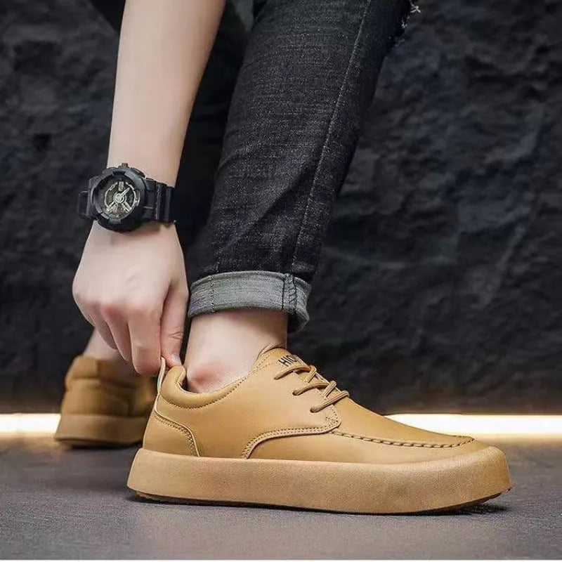Men's brown casual lace-up shoes with round toe and flat heel on a white background