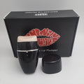 Black electric lip plumper with silicone nozzle and USB cable