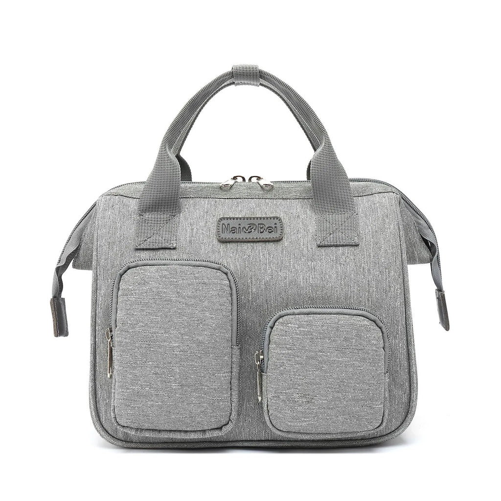 Pink grey waterproof Oxford cloth women's crossbody handbag showing external pocket and large main compartment.