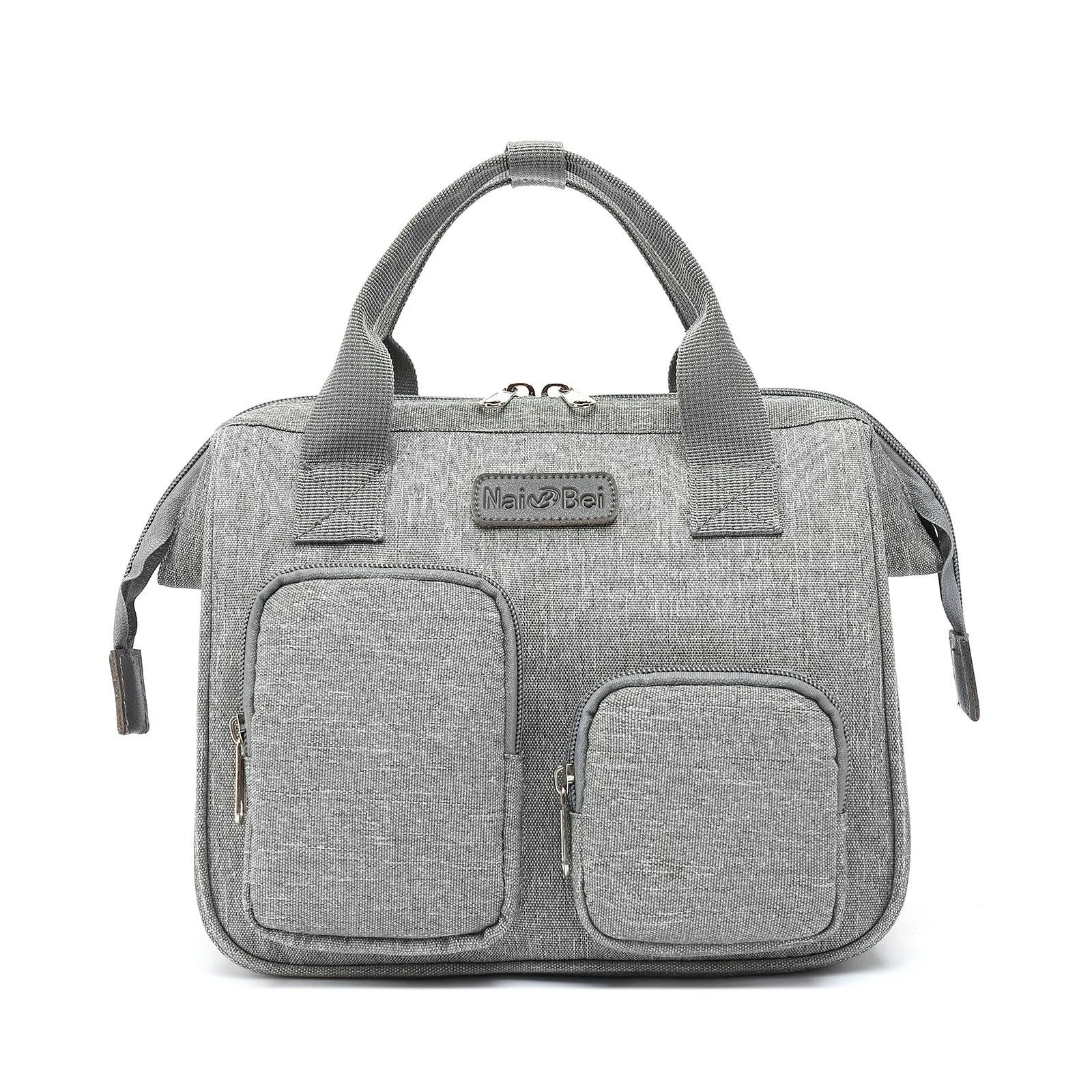 Pink grey waterproof Oxford cloth women's crossbody handbag showing external pocket and large main compartment.