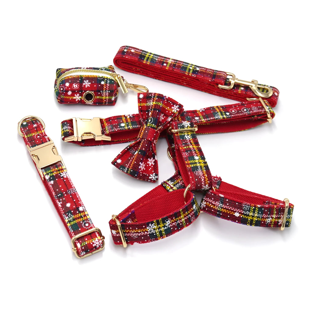 Red Christmas pet collar set with matching traction rope, bow, chest back, and stool bag accessories