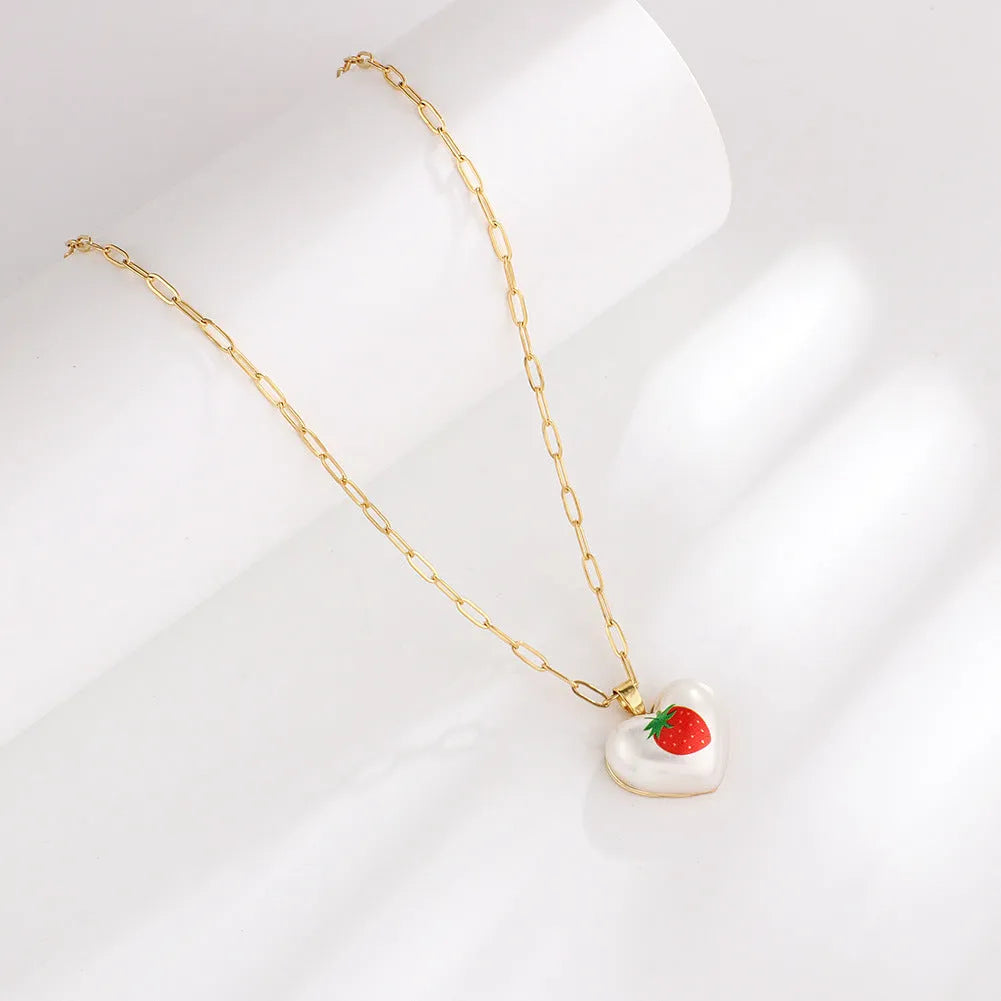 Fresh style geometric necklace with choice of apple, pineapple, strawberry, cherry, and pear fruit pendants on an adjustable chain.