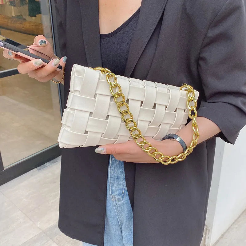 Women's one-shoulder underarm bag with PU exterior, polyester lining, and 27cm width in black, green, khaki, red, or white.