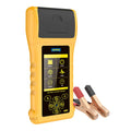 Autool BT760 vehicle battery tester with colour screen, test clips, and built-in printer on a workshop bench