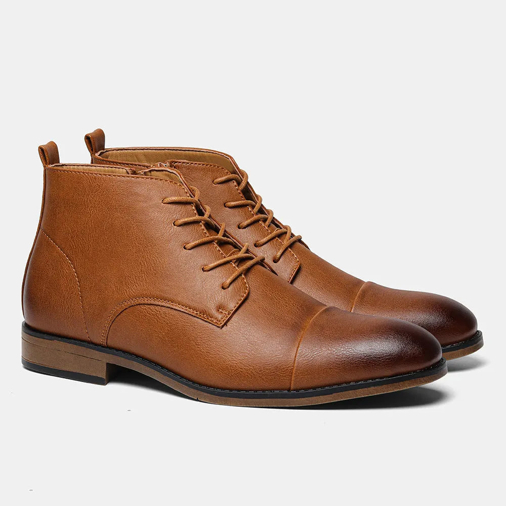 Men's plus size brown Chelsea ankle boot with a side zip, round toe, and low wooden sole.