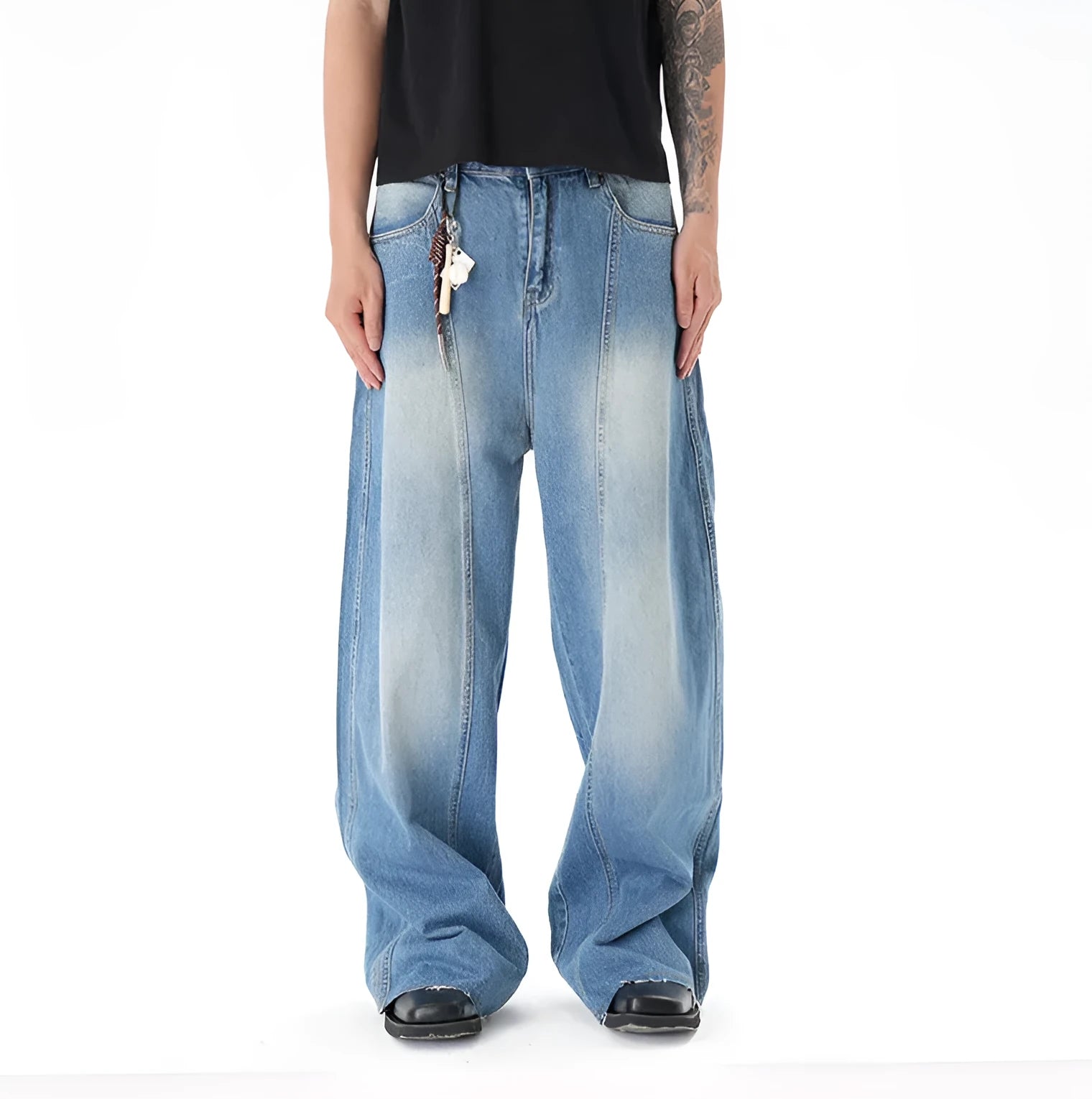Light blue vintage washed wide leg denim jeans with a zipper fly on a mannequin.