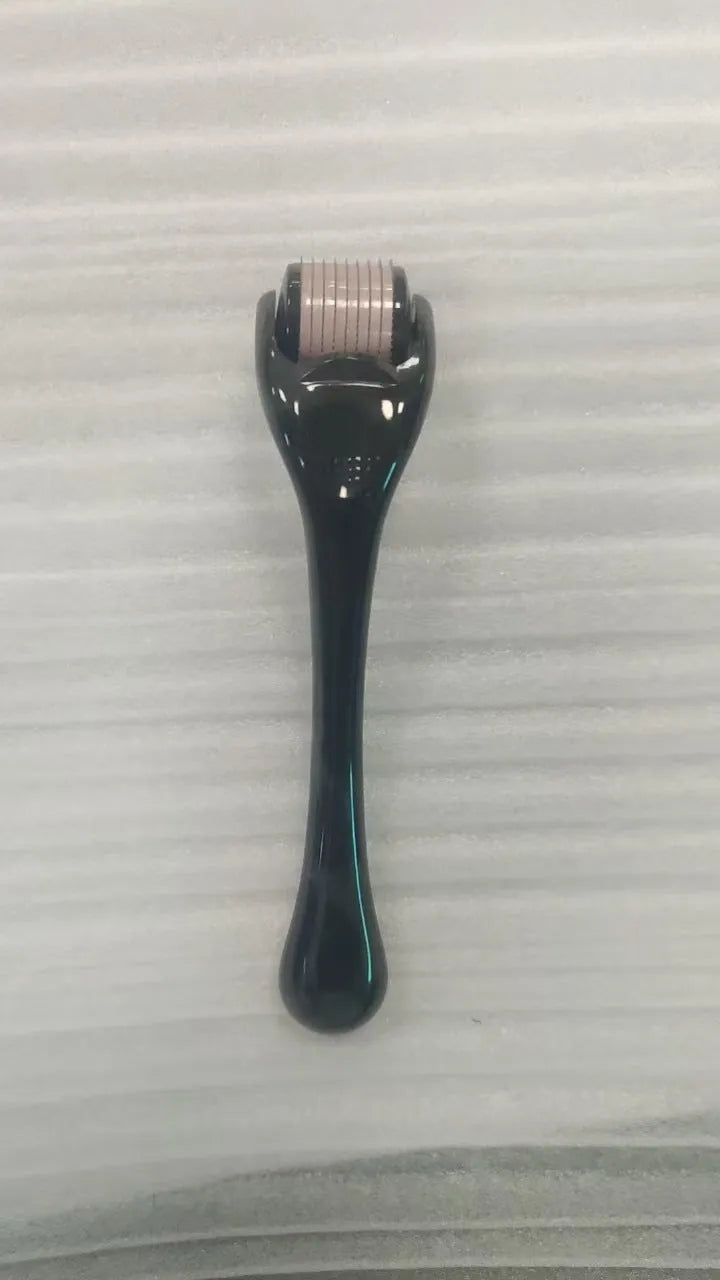 540 micro needle roller with PC handle and coloured wheel showing needle configuration for skin treatment