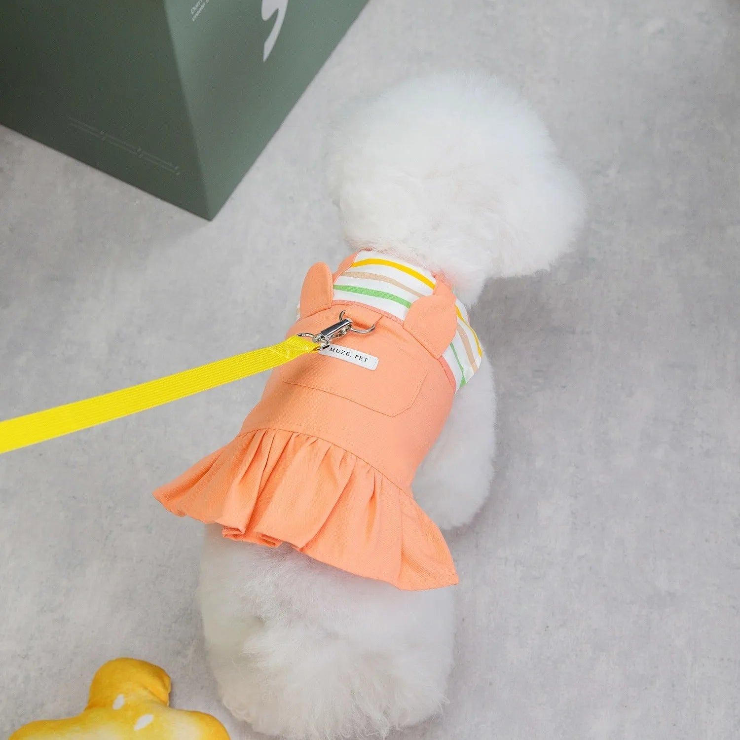 Orange and yellow striped patchwork cotton skirt for dogs on mannequin