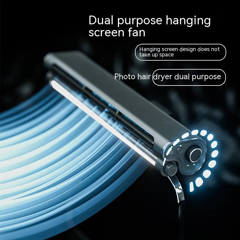 Black bladeless fan with lighting lamp attached to laptop screen showing USB connection and screen clamping mechanism