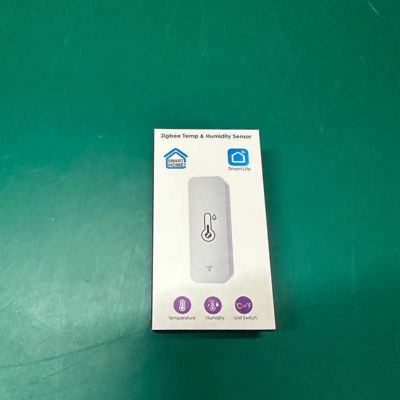 White rectangular WiFi Zigbee temperature humidity sensor measuring 72mm by 25mm by 20mm