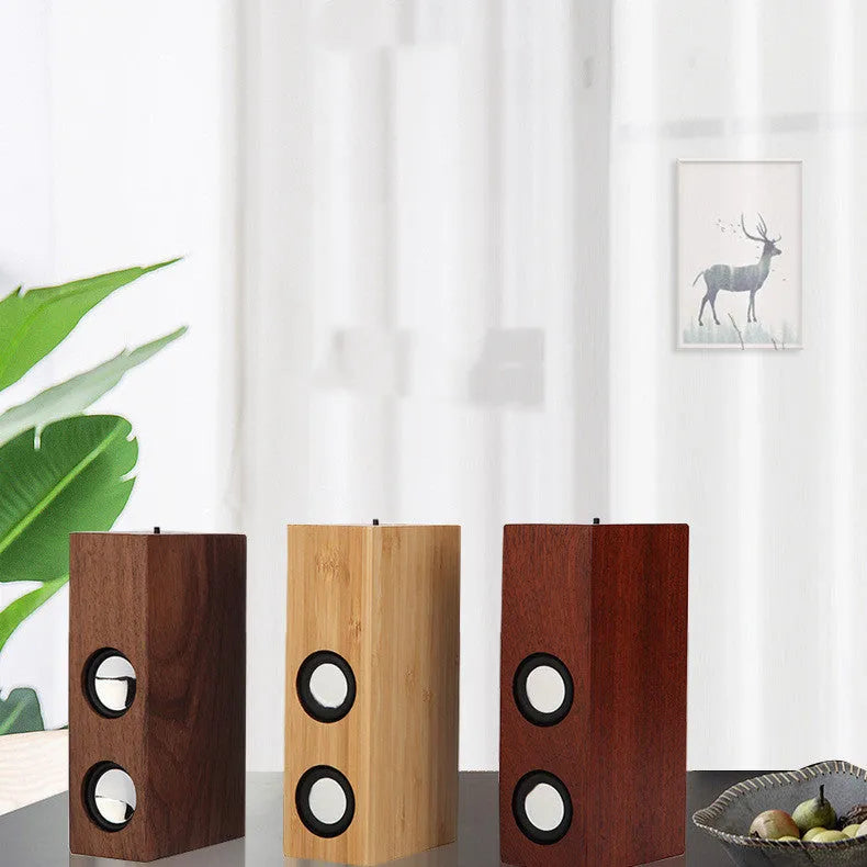 Retro wooden Bluetooth speaker in bamboo finish showing USB port and compact 15cm design