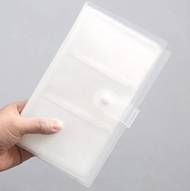 Blue PVC and PP business card holder book with protective shell showing insert pockets and smile logo.