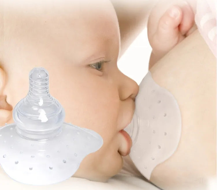 Silicone nipple protectors for breastfeeding mothers in transparent and pink colours