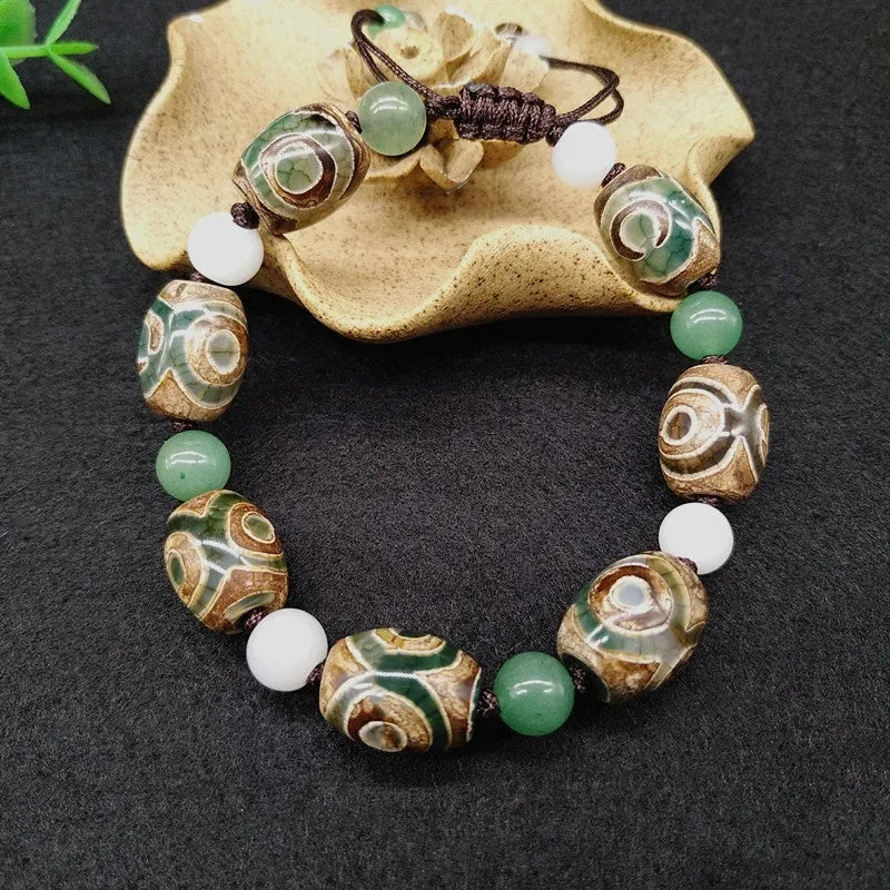 Green agate ethnic bracelet with geometric three-eye beads and adjustable closure