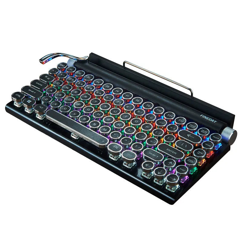 Black Dot retro typewriter mechanical keyboard with 83 keys, seven-colour backlight, and Bluetooth connectivity on a desk