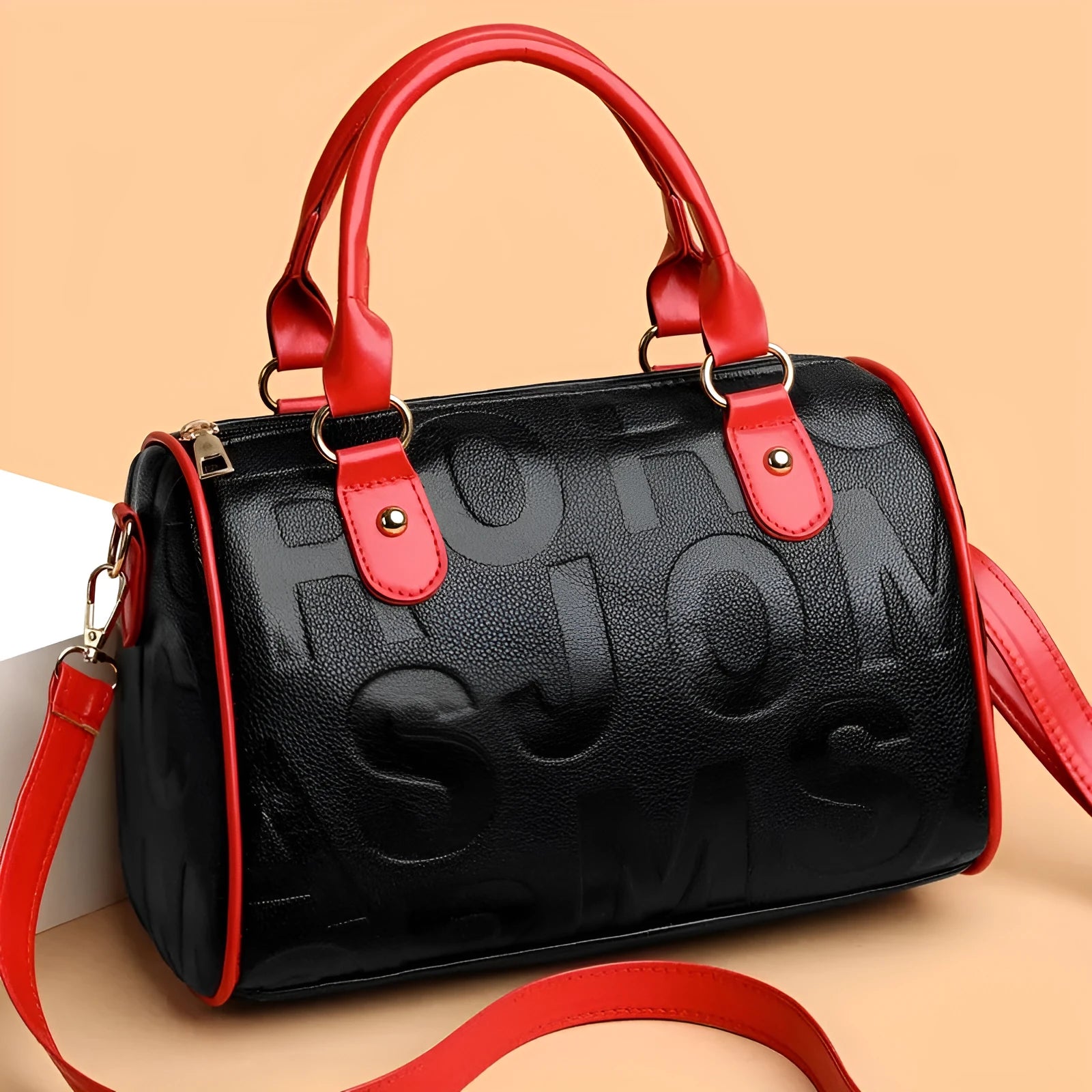 Brown cylindrical PU leather crossbody bag with three shoulder straps showing interior organisation