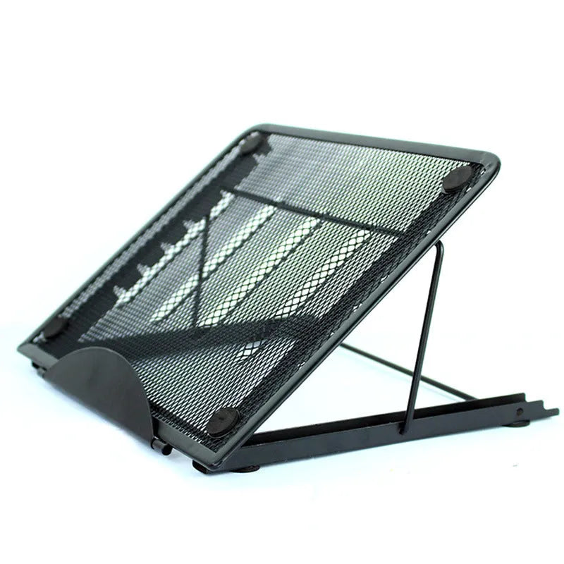 Folded metal laptop stand in silver colour showing slim 1.5cm profile next to a laptop.