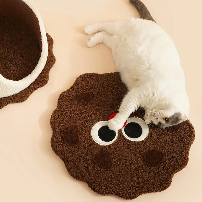 Khaki coloured cat nest bed shaped like a sandwich cookie, showing enclosed house design.