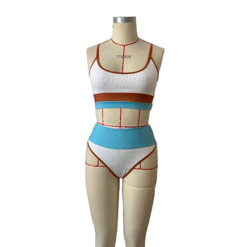 Women's solid colour quick-dry swimwear set with matching top and shorts