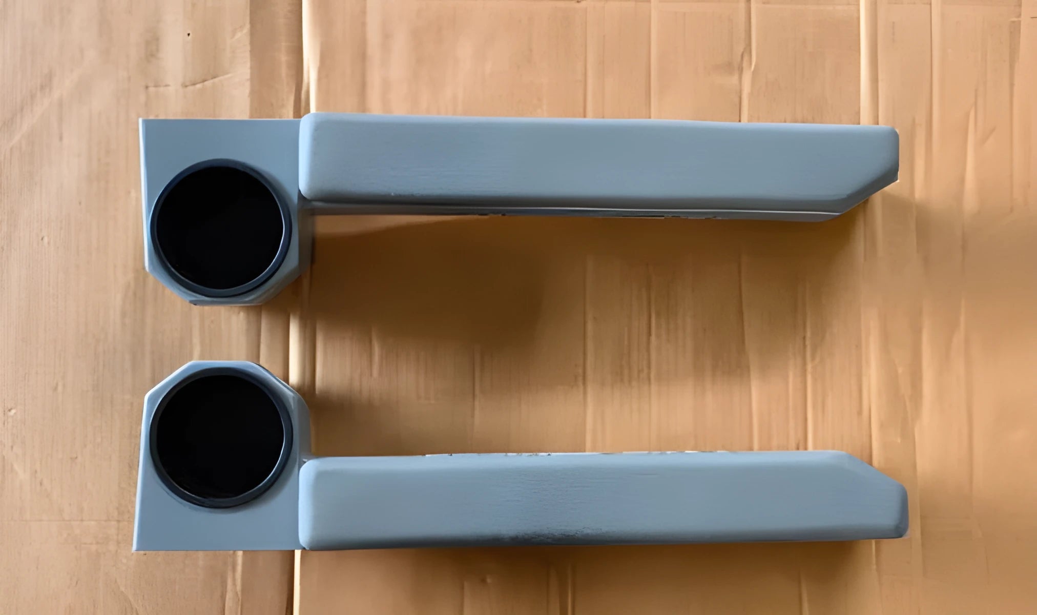 Grey magnetic car armrest door ring frame set showing two pieces for vehicle installation