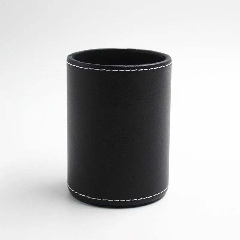 Round black leather pen container measuring 8.0cm diameter and 10.8cm height for desk organisation