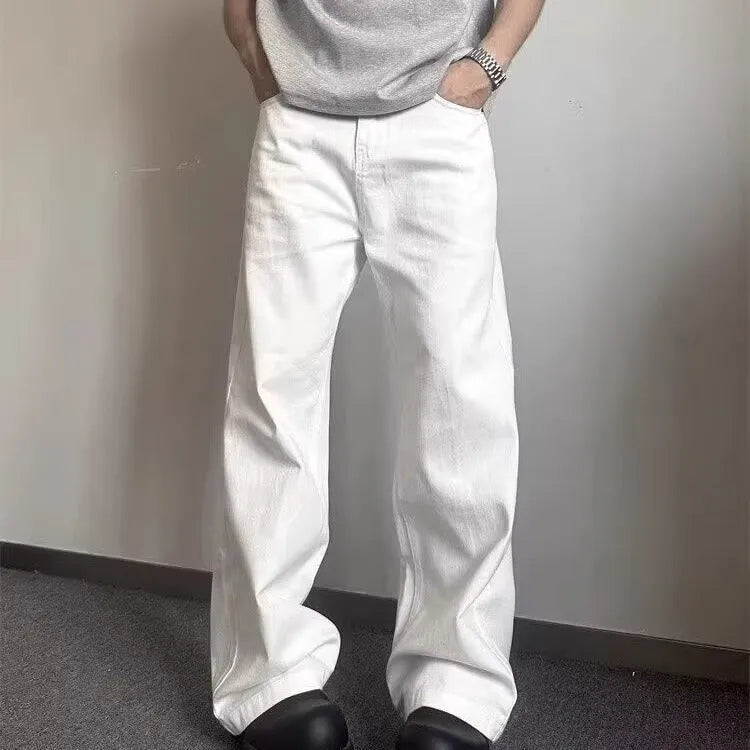 Men's straight-leg white jeans with mid-waist and zipper fly, displayed on a hanger