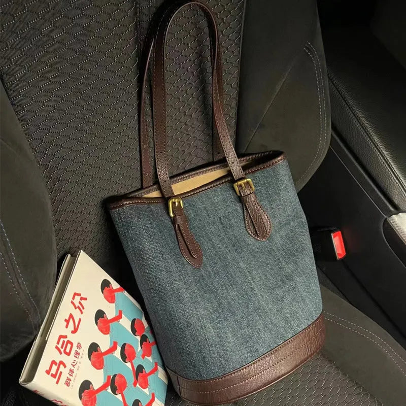 Denim patchwork retro one-shoulder bucket handbag showing large capacity and polyester construction
