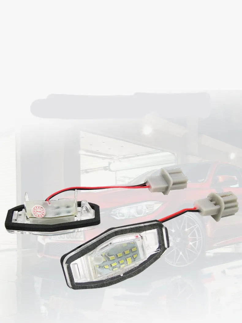 White LED license plate light unit for Honda CIVIC cars on a plain background.