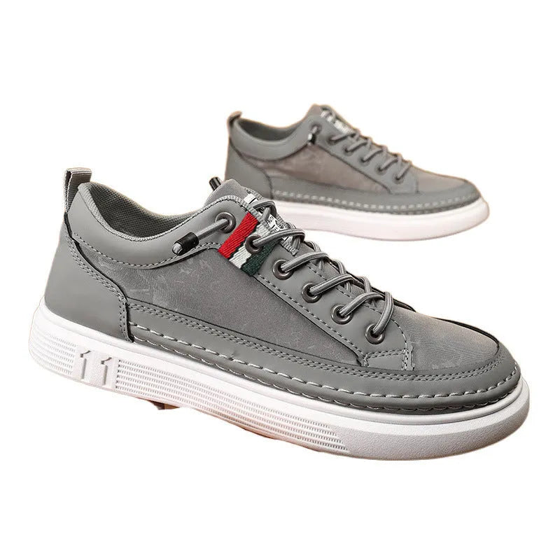 Men's grey high-top canvas bandage sneakers with a round toe on a PVC sole.