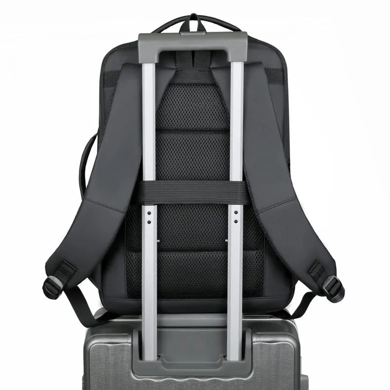 Black waterproof business backpack with 20-35L capacity and curved shoulder strap for commuting
