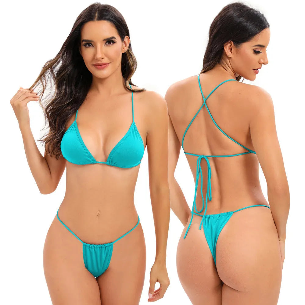 Women's candy coloured cross strap swimsuit with multiple straps and briefs style