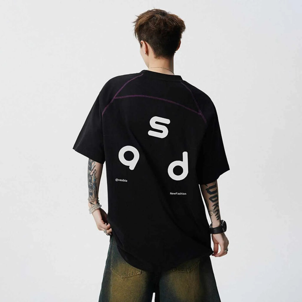 Men's loose fit black cotton T-shirt with a printed letter design on the front.