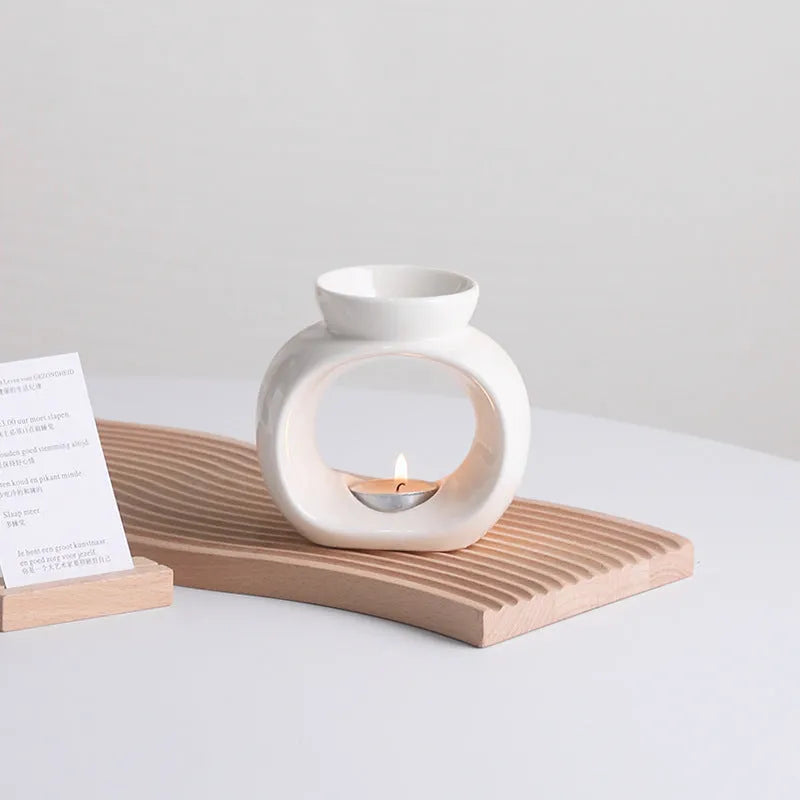 White ceramic aromatherapy stove ornament with Nordic design and anti-dry burning safety feature
