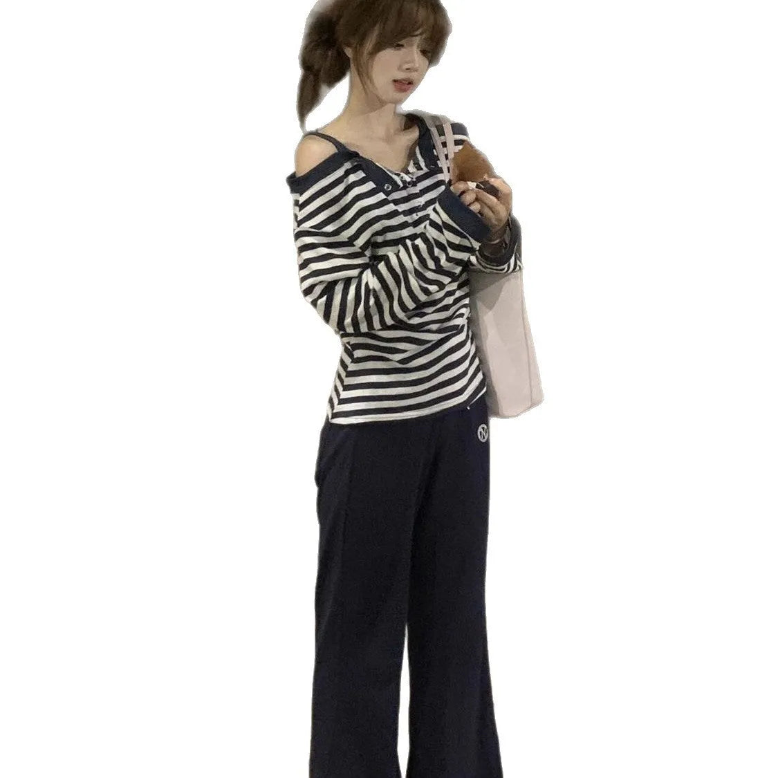 Dark blue women's oversized long-sleeved t-shirt with embroidery and button details on viscose fabric