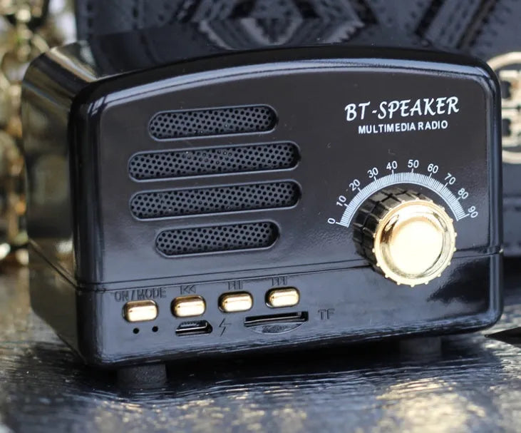 Vintage wood Bluetooth speaker in black finish showing compact 93mm height with control buttons