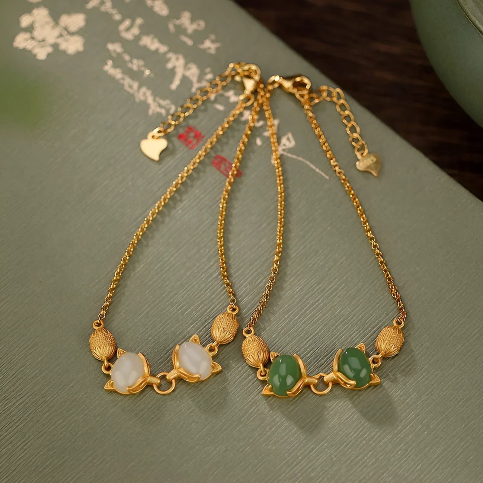 925 silver women's bracelet with fox charm and genuine Hetian jade stone on adjustable chain.