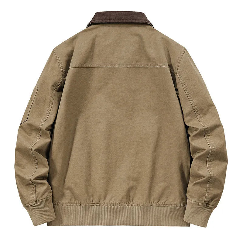 Men's beige washed cotton baseball-style flight jacket shown on a hanger.