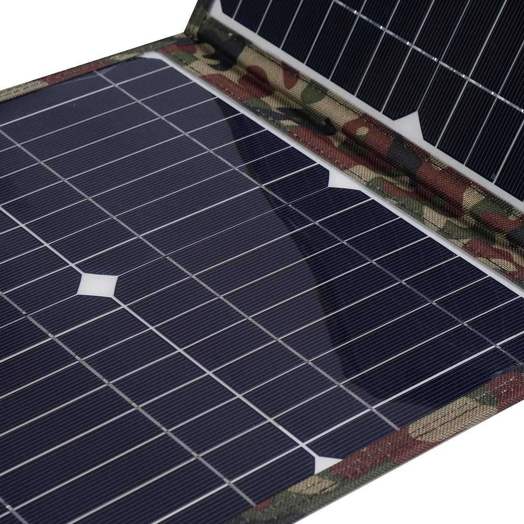 Black foldable solar panel showing three monocrystalline silicon cells, folded to 87cm length with carrying bag and accessories