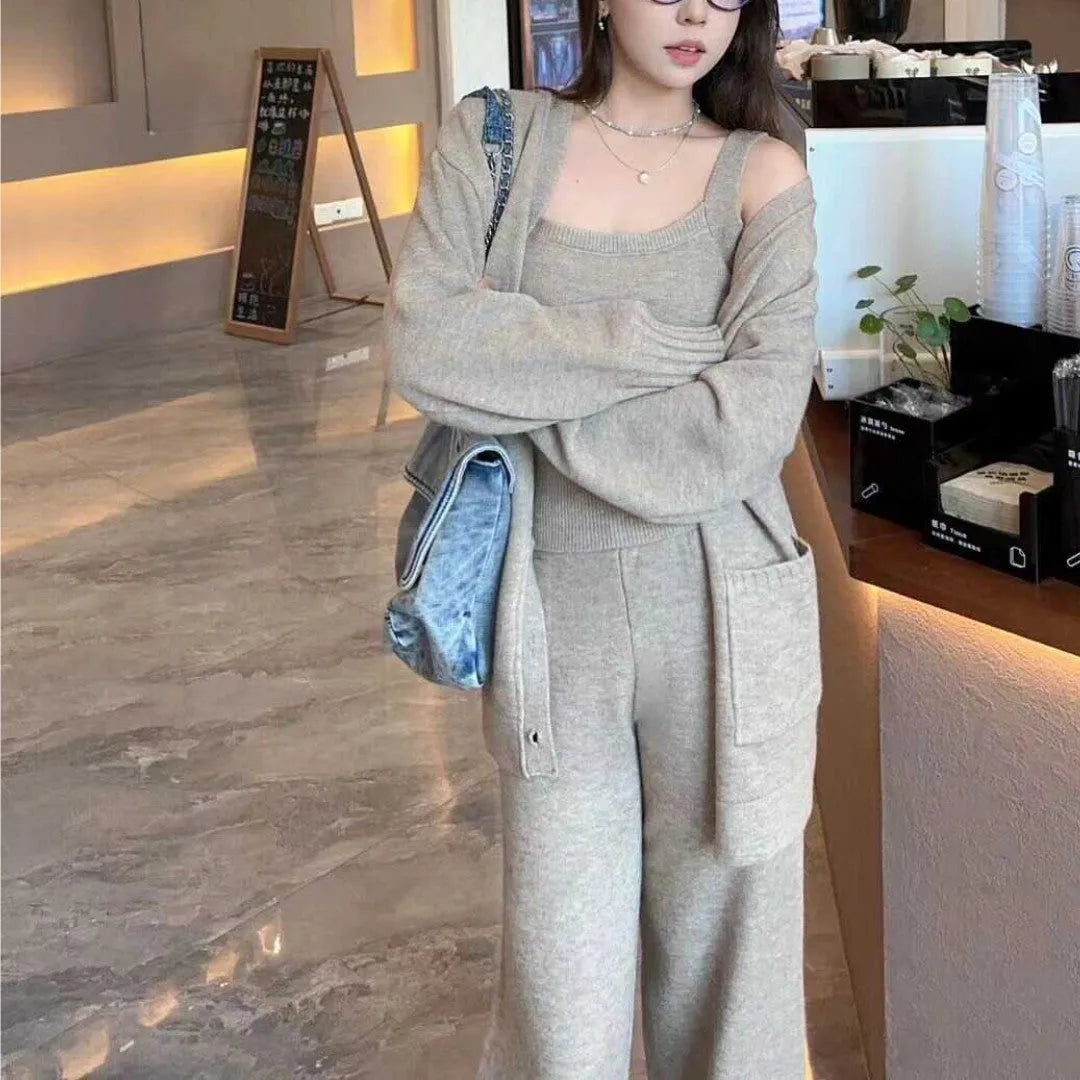 Women's wool blend knit three-piece set showing vest, cardigan coat, and pants in loose fit with seamless construction