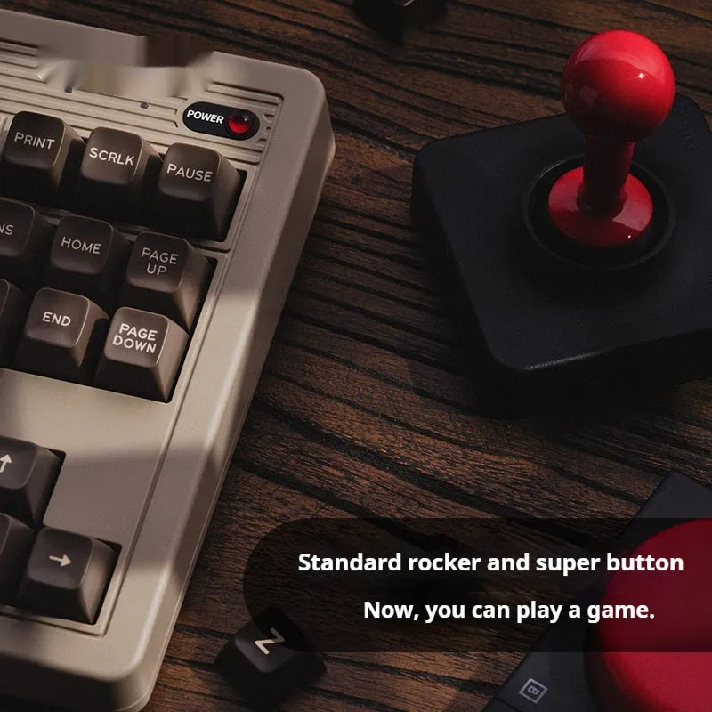 Retro black mechanical gaming keyboard with Bluetooth wireless connectivity and C64-inspired design