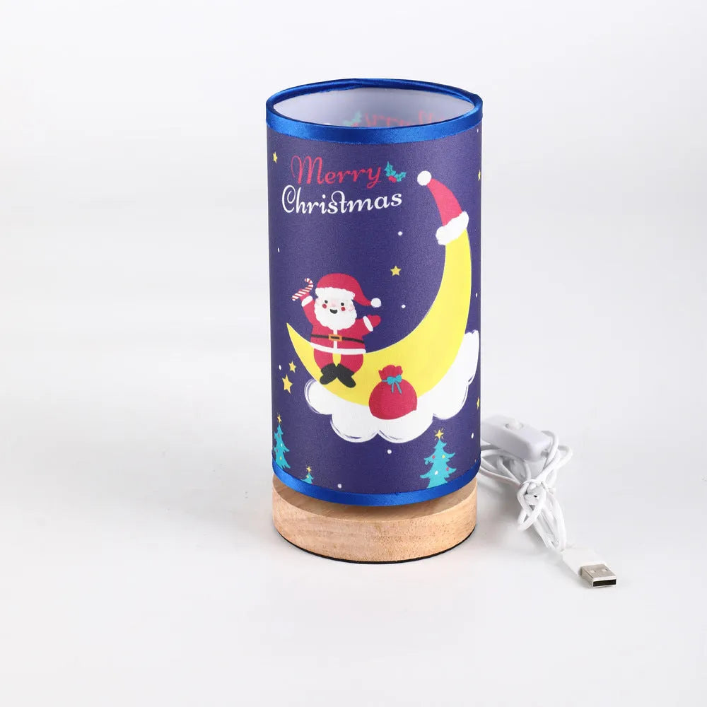 Moon-shaped Santa Claus LED night light with USB plug and bamboo base.