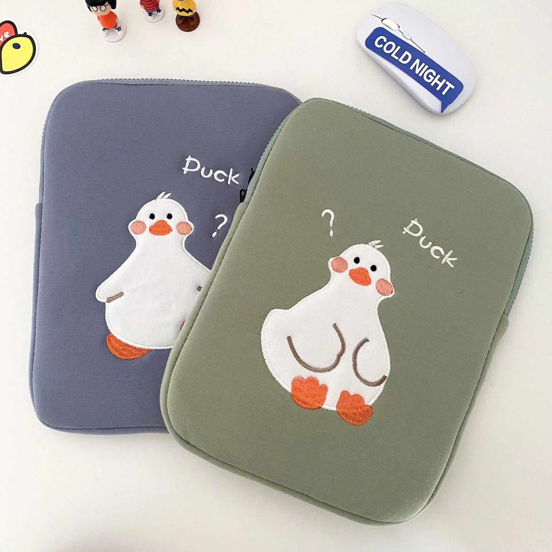 Blue cotton tablet case with cartoon duck embroidery and zipper closure for 11-inch tablets