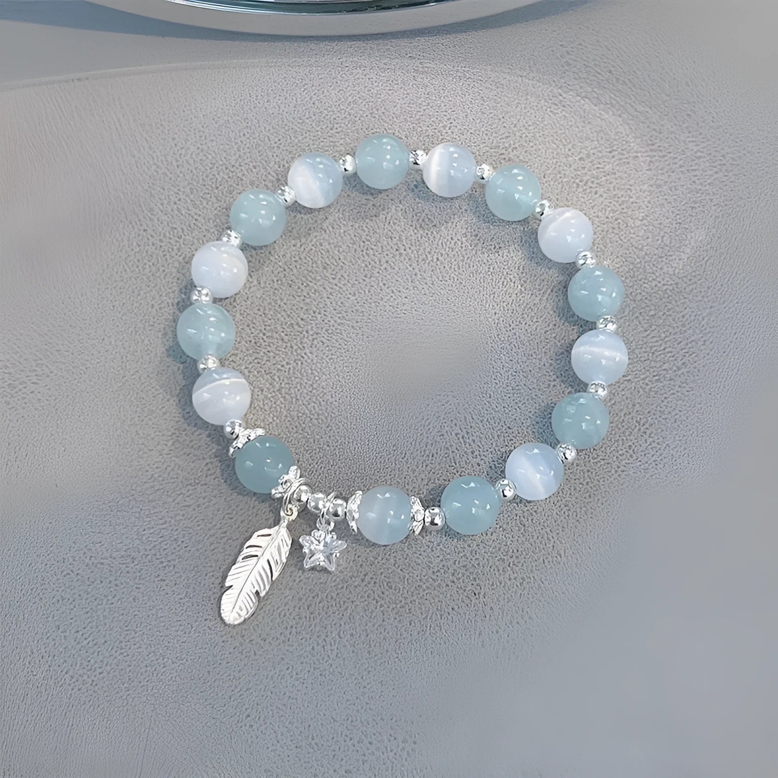 Korean style glass bracelet with feather XINGX blue moonlight colour and eight Awn star decorative elements