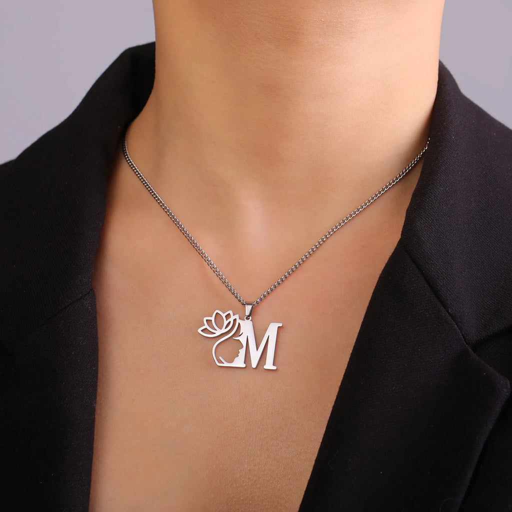 Stainless steel cross chain necklace with electroplated finish in gold or silver tone, showing pendant attachment and link detail