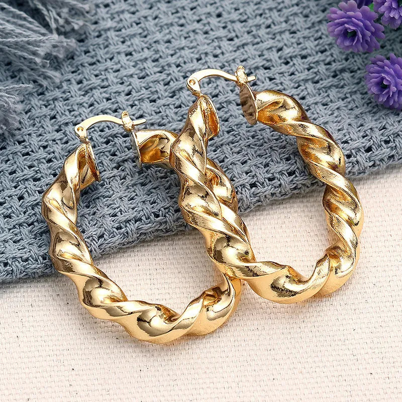 Geometric ring design ear clip earrings in copper with electroplated finish